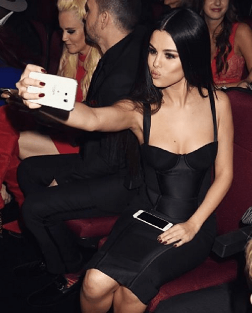 Selena Gomez black slip dress AMA 2015 photo Chris Classen