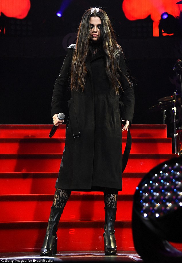 Selena black coat Staples Center Jingle Ball photo Getty Images for iHeartMedia
