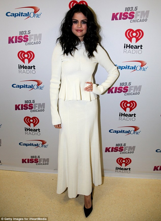 Selena Gomez white dress chicago Jingle Ball photo Getty images for iHeartMedia
