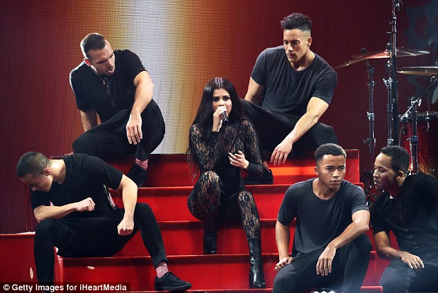 Selenas Gomez black lace catsuit Jingle Ball Staples Center photo Getty Images for iHeartMedia