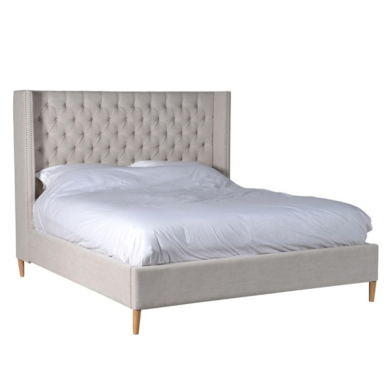 button_upholstered_linen_bed