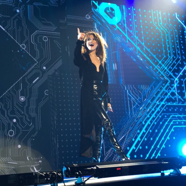 Selena Gomez black plunge top pvc trousers revival tour photo slaygihadid