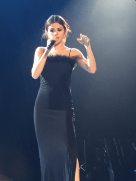 Selena Gomez fur trimmed strappy dress Revival tour photo mintzebra