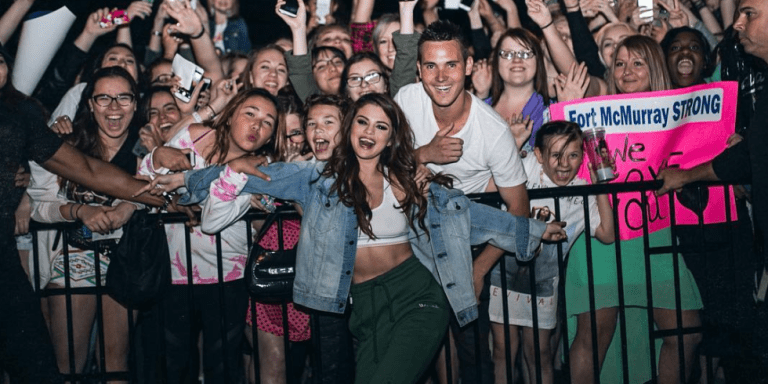 Selena Gomez green pants denim jacket Edmonton May 2016