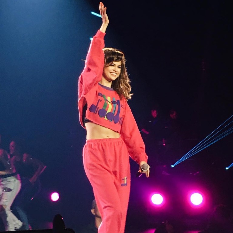 Selena Gomez pink top and joggers Revival tour photo akikobad