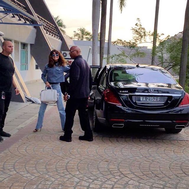 Selena Gomez blue shirt white bag Indonesia photo Kashal Randhawa