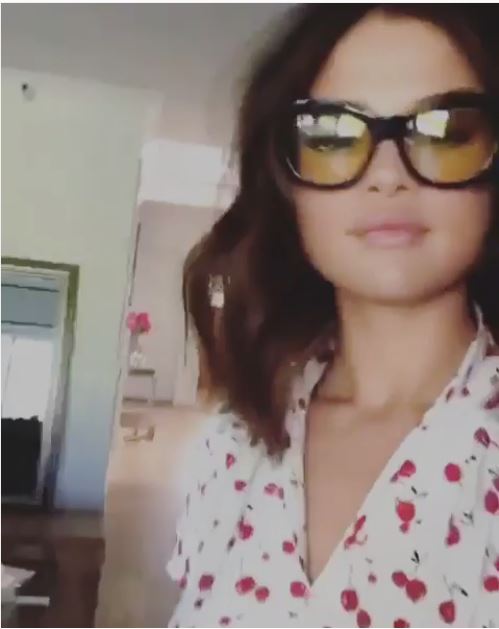 Selena Gomez white cherry print dress
