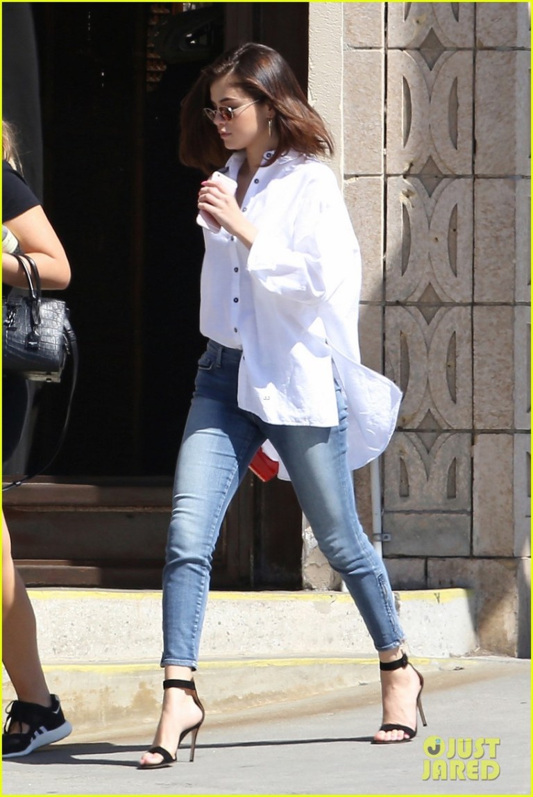 Selena gomez white shirt jenas black sandals March 2017 photo AKM-GSI