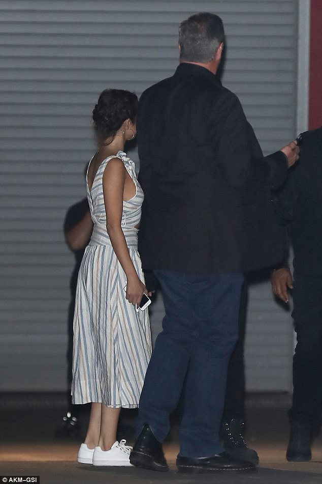 Selena Gomez white striped dress The Forum April 2017 photo AKM-GSI