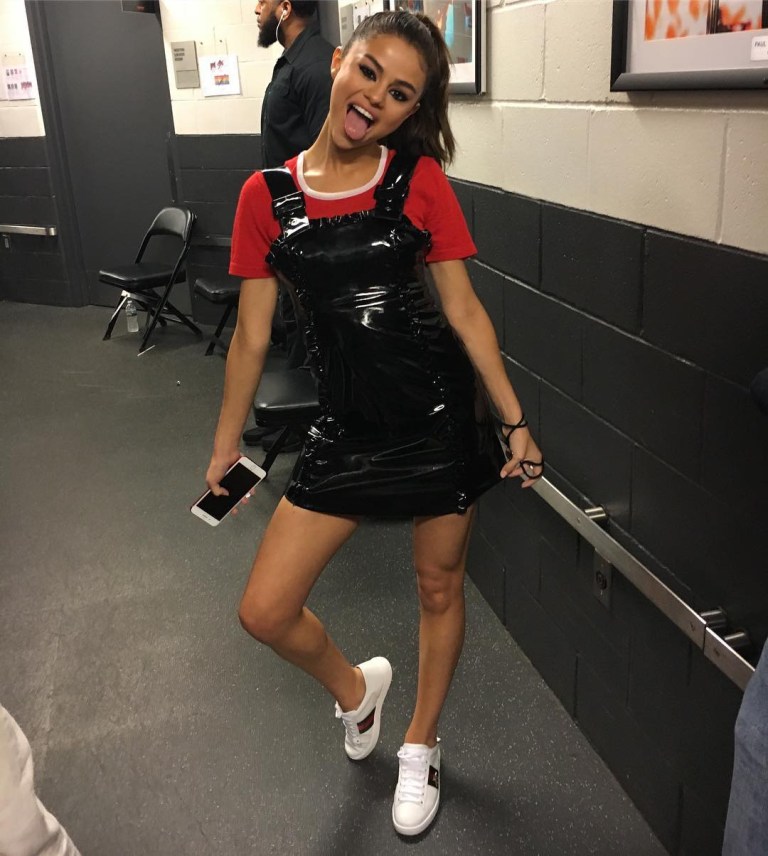 Selena Gomez red t-shirt black pvc dressw hite trainser sneakers 6 June 2017 photo stellagreenspan