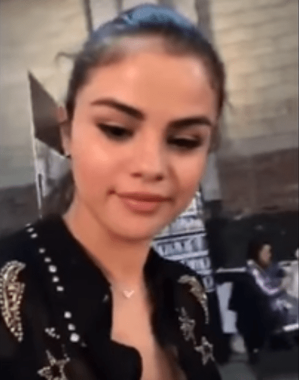 Selena Gomez black dress with silver stars October 2017 cropped