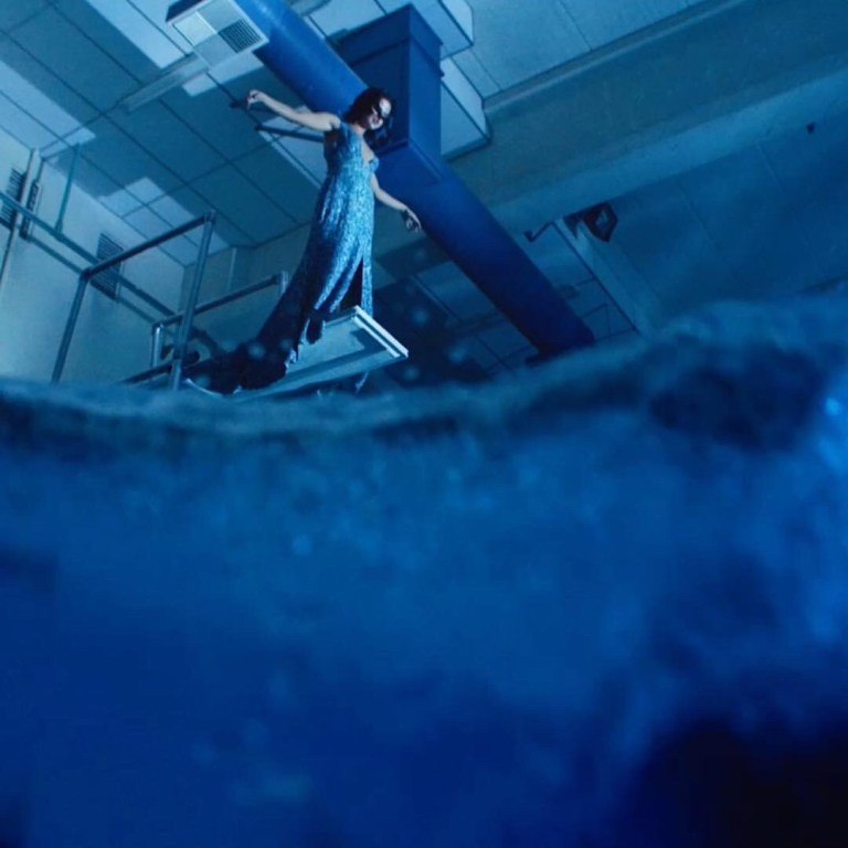 Selena Gomez green sequin dress wolves video