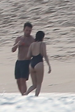 Selena Gomez style fashion outfit black one piece swimsuit cabo Mexico December 2017