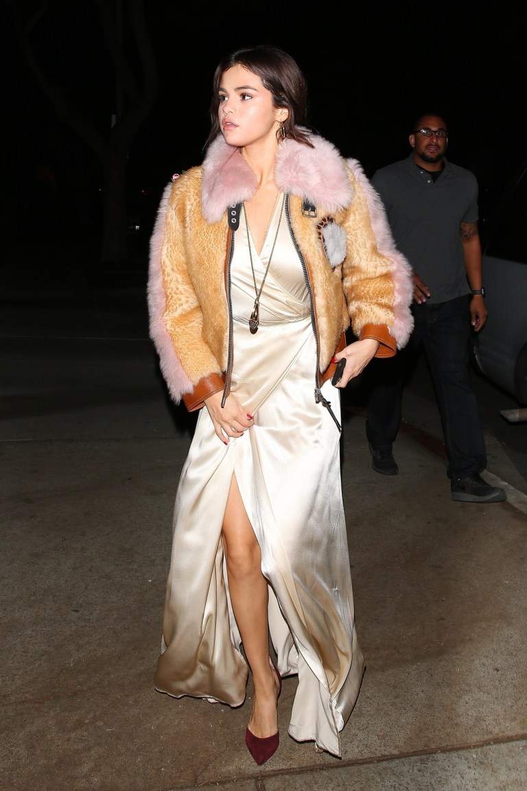 Selena gomez style cream satin maxi dress faux fur jacket burgundy pumps 2 Fevruary 2018