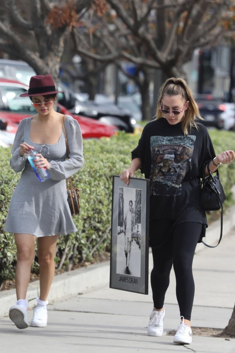 Selena Gomez style grey dress red hat white sneakers brown LV bag February 2018