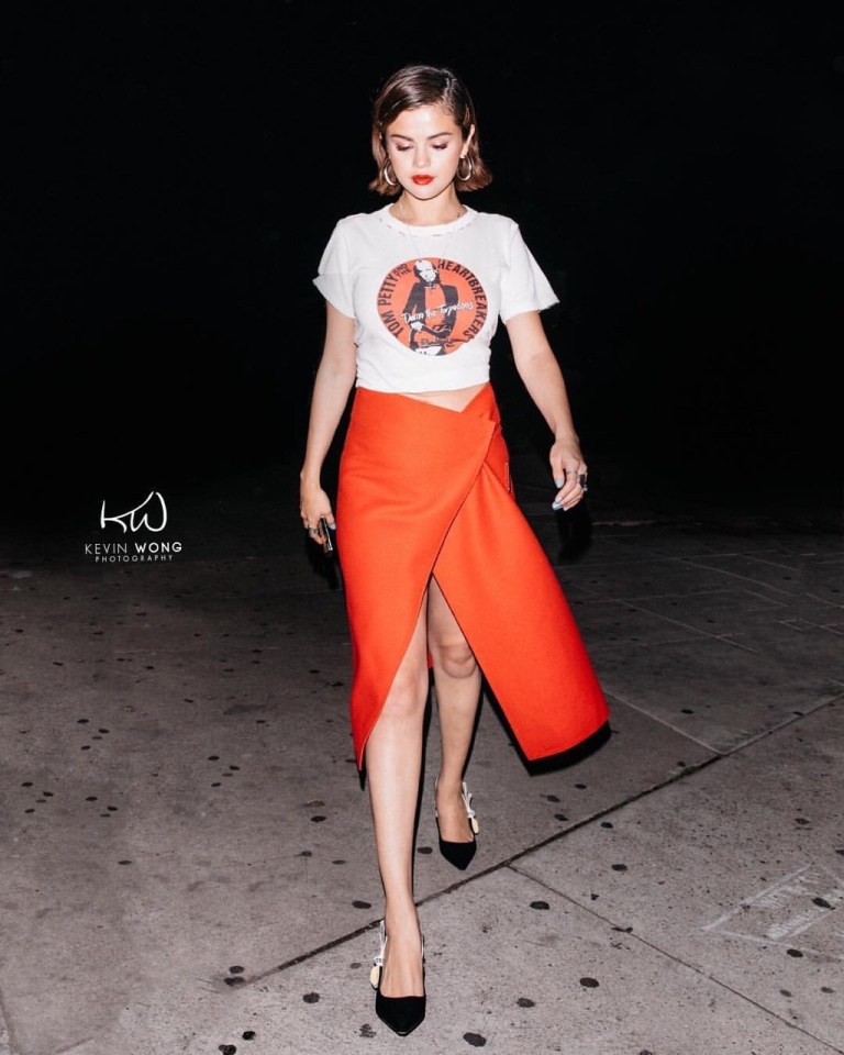 Selena gomez style clothes fashion blog Tom Petty t-shirt orange wrap dress March 2018