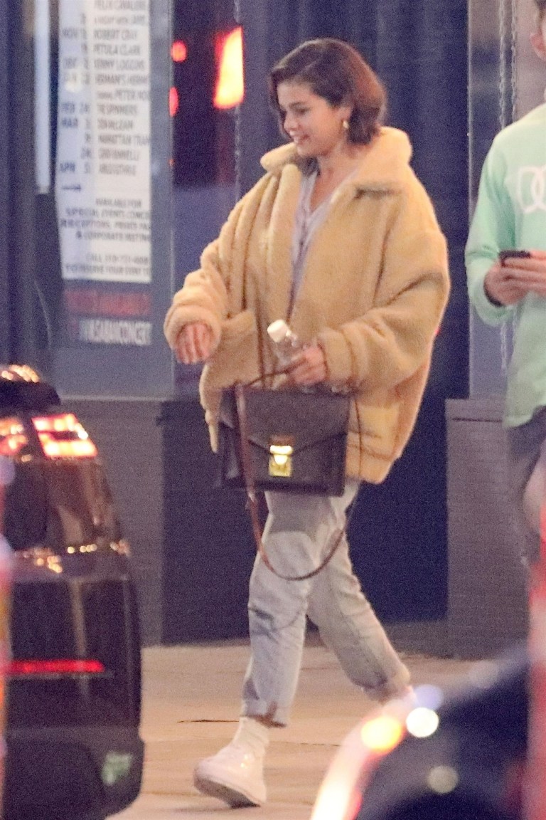 Selena Gomez style clothes outfit blog caramel fleece striped shirt jeans white trainers