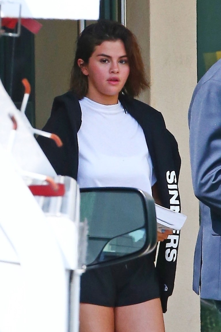 Selena Gomez style clothes outfit sinners jacket white top black shorts