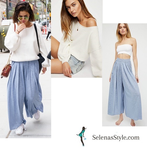 Selena Gomez style white top blue wide leg trousers white trainers brown bag NY May 2018