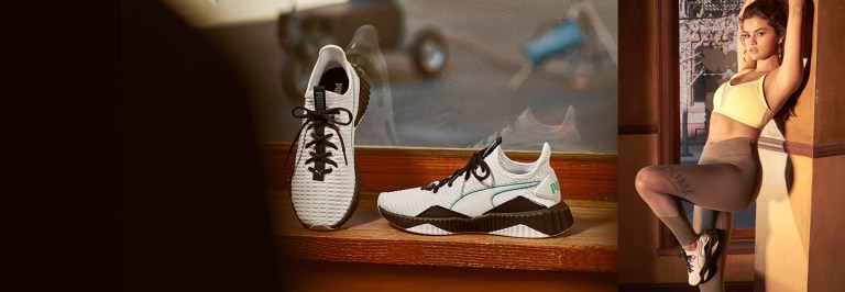 Selena gomez yellow sports bra brown leggings white and black shoes Puma 2018