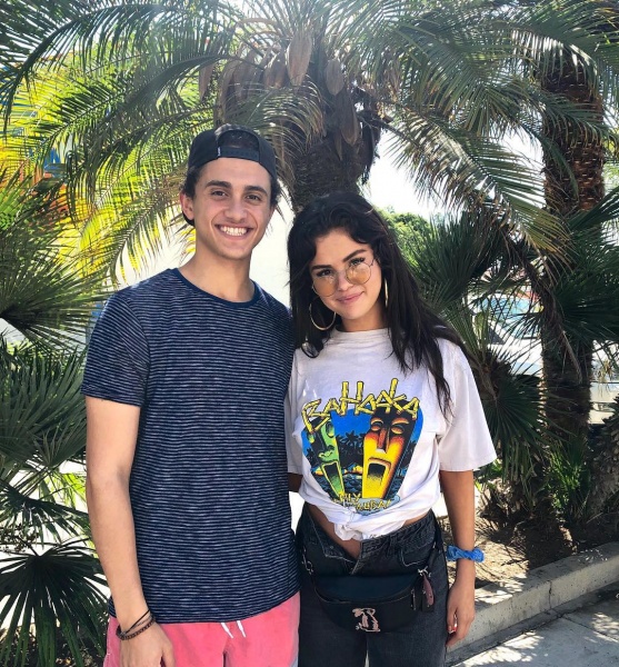 Selena Gomez Bahooka t-shirt bunny belt bag gold hoop earring august 14 2018