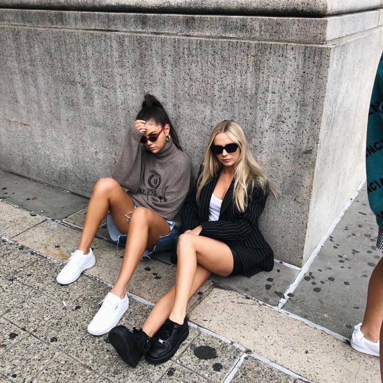 Selena Gomez style grey sweatshirt denim shorts white sneakers September 2018