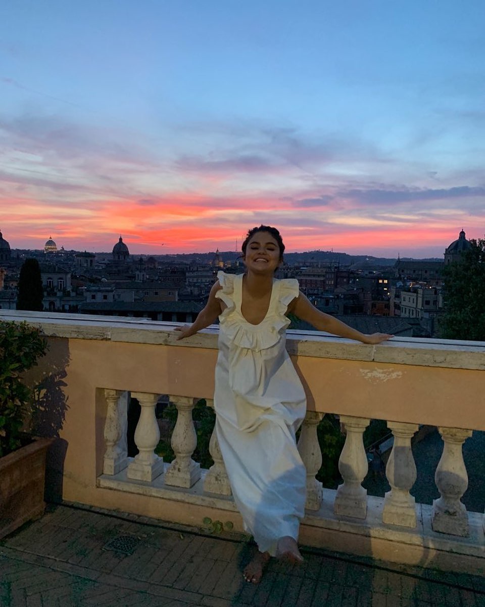 how to find Selena Gomez white frill neck maxi dress Italy July 2019 photo Selena Gomez