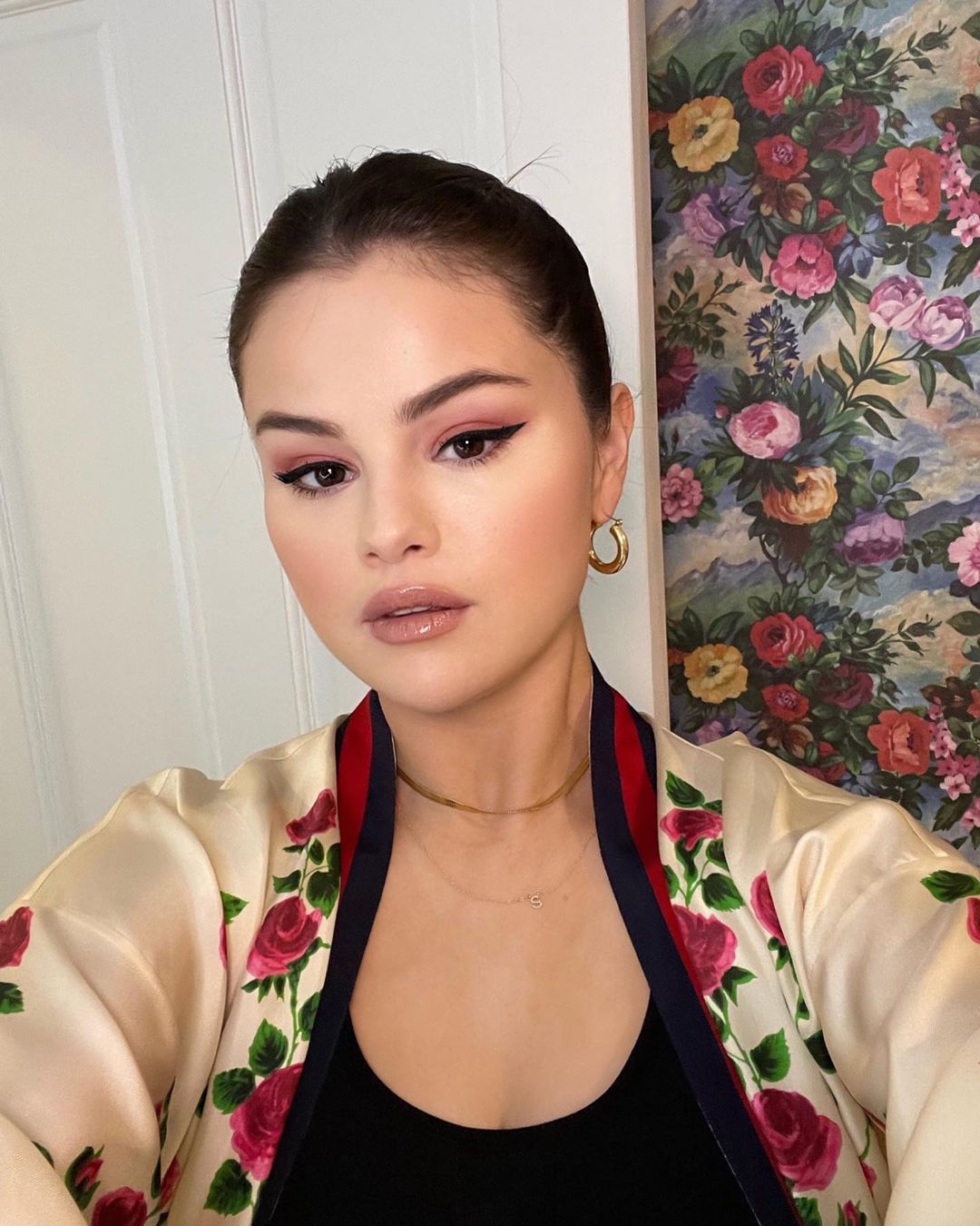 where to get all Selena Gomez outfits cream robe with rose print trim Vogue Beauty Secrets 7 September 2021 Photo Selena Gomez