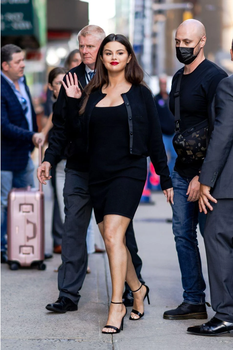 where to get Selena Gomez black rib dress black cardigan black sandals the Late Show 7 September 2021 Photo Gotham Getty Images