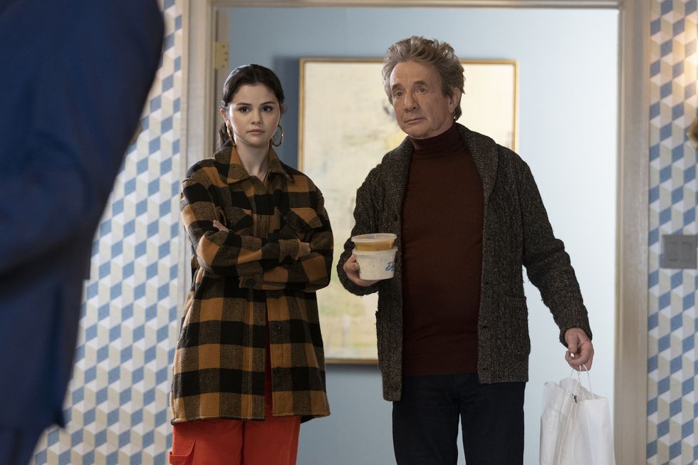 where to get Selena Gomez brown and black plaid shirt orange cargo pants gold hoop earrings Only Murders In The Building December 2020 Photo CRAIG BLANKENHORN DISNEY