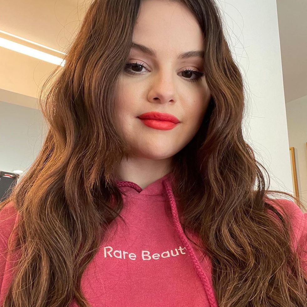 where to get Selena Gomez pink Rare Beauty Hoodie September 2021 Photo Rare Beauty