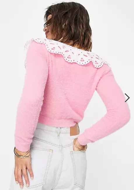 Glamorous cropped vintage style cardigan with lace collar in pink back view