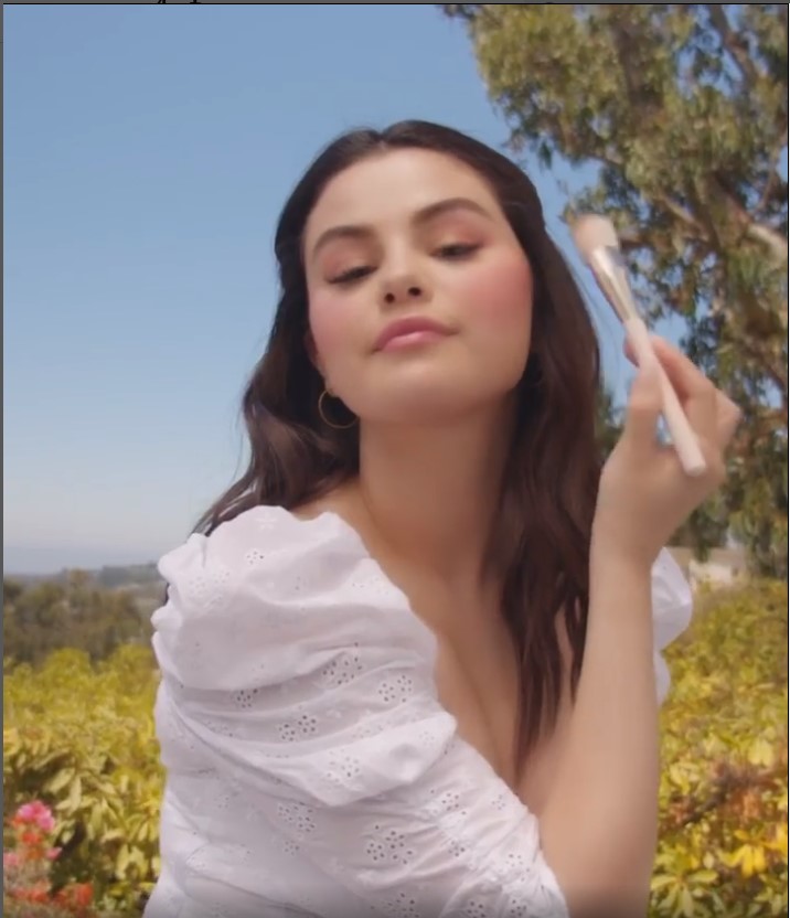 where to get all Selena Gomez outfits white broderie dress gold hoops Rare Beauty 26 December 2021