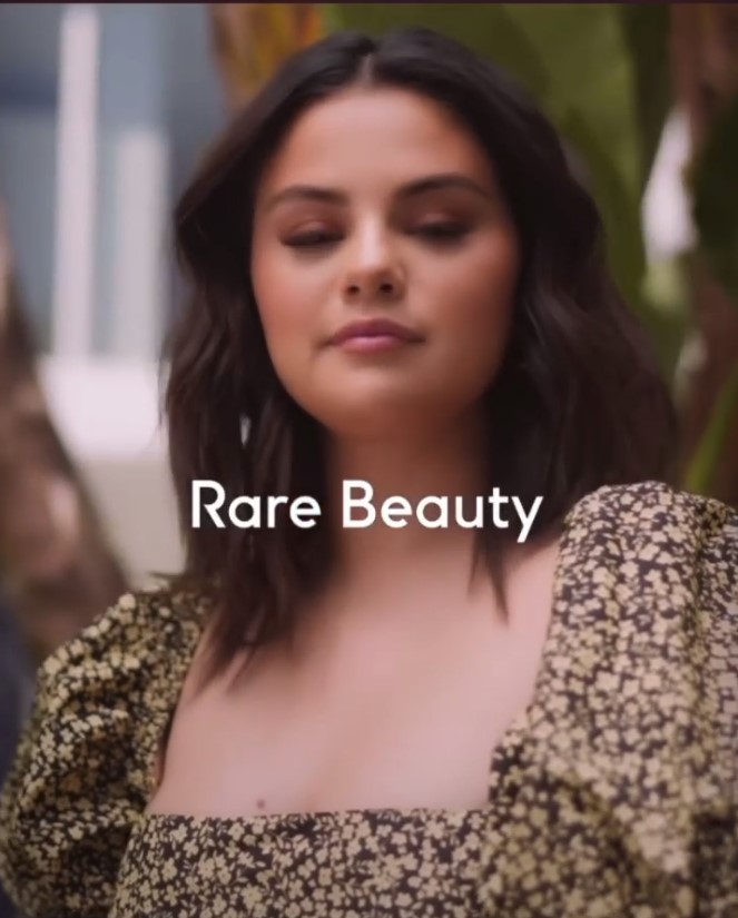where to get all Selena Gomez outfits yellow and brown square neck dress gold hoops Rare Beauty 9 December 2021